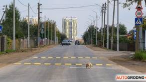С асфальтом, но без тротуаров: улицу Асфальтную в Гродно открыли спустя месяц после начала ремонта