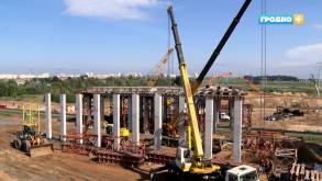 Строители значительно опережают сроки по укладке асфальта на новой объездной между «Азотом» и Озёрским шоссе в Гродно