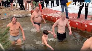 Как в Гродно отметили Крещение купанием в проруби